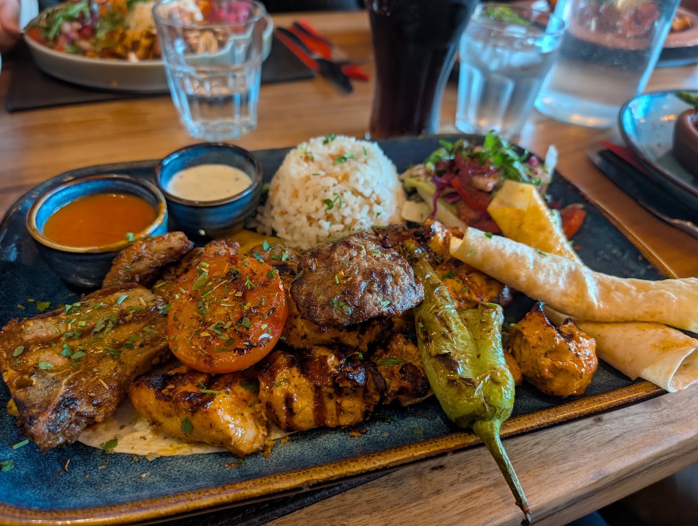 A mixed charcoal grill at Lezzet Mediterranean Bistro